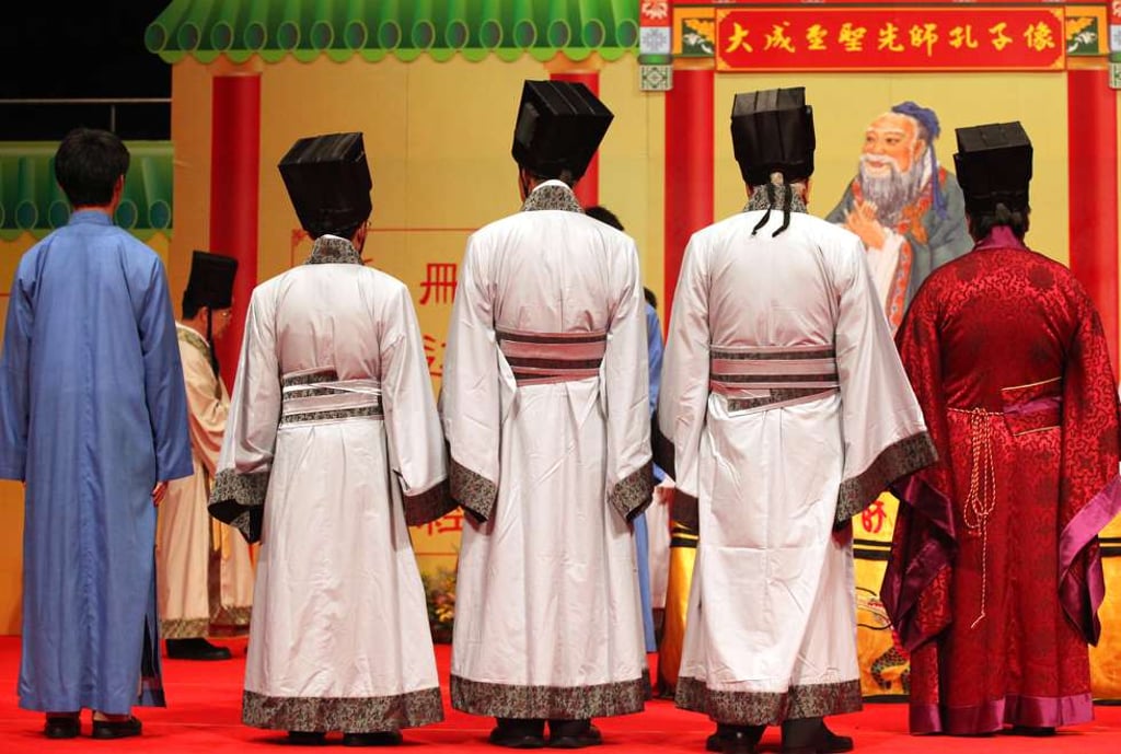 Members of the Confucian Academy take part in a celebration of Confucius’ 2,561st birthday at the Queen Elizabeth Stadium, in October 2010. Picture: SCMP