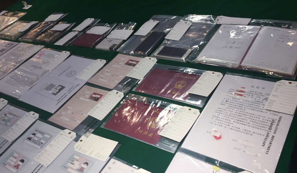 Marriage and ID documents recovered during the operation.