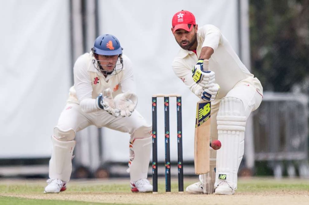 Babar Hayat plays a shot against the Netherlands. Photo: Panda Man Babar Hayat plays a shot against the Netherlands. Photo: Panda Man
