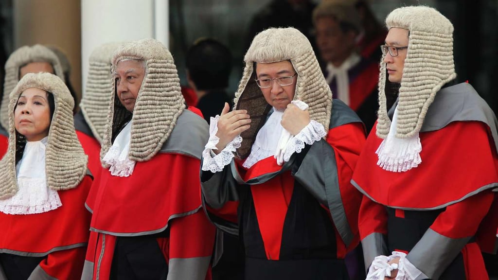 Hong Kong judges and barristers still wear powdered horsehair wigs in the higher courts and on ceremonial occasions. Picture: SCMP