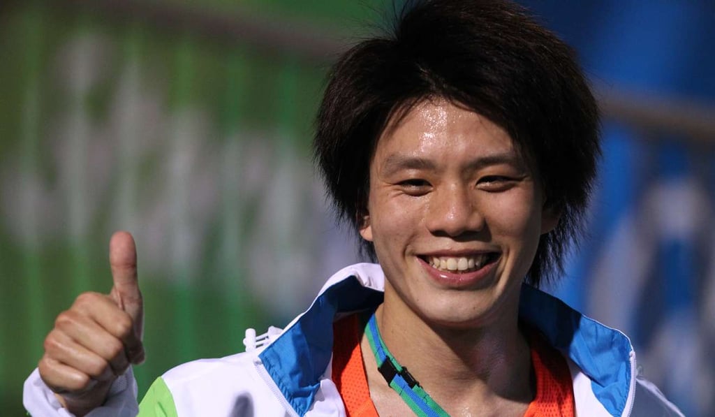 Gi Ka-man after winning the half marathon in 2012. Photo: Nora Tam