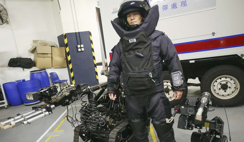 Chan Chor-fung from the Explosive Ordnance Disposal Bureau wears full protective gear. Photo: David Wong