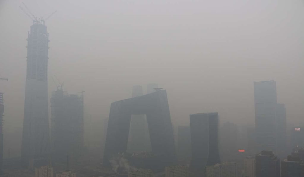Buildings in the centre of Beijing shrouded in smog last month. Photo: Reuters