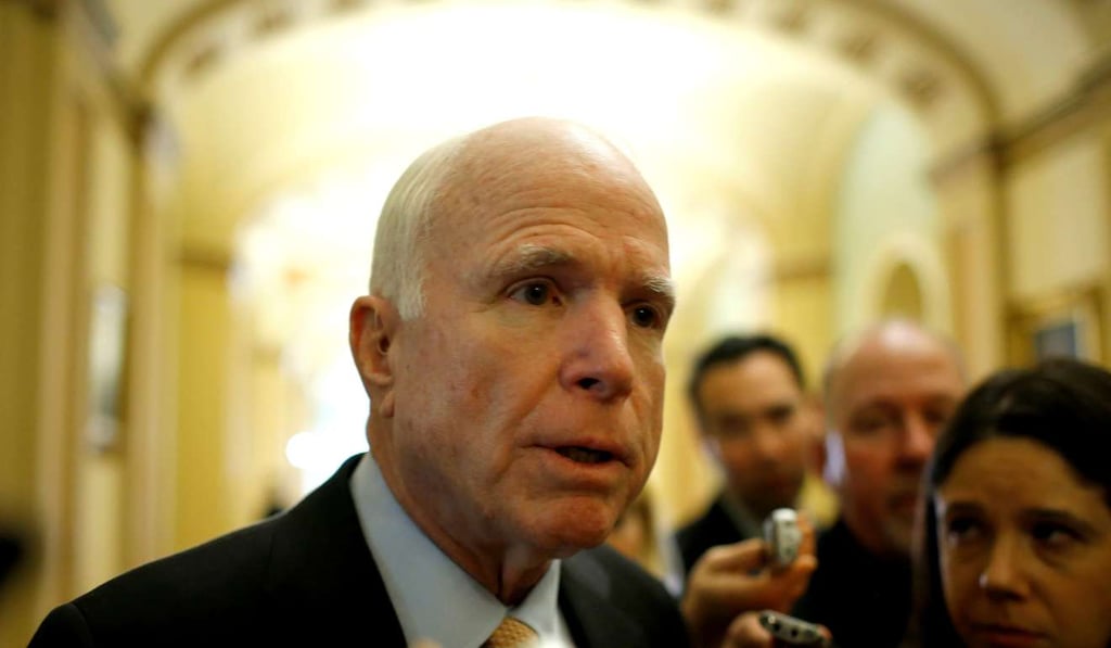 Senator John McCain (R-AZ) speaks to reporters as Republican lawmakers eye investigations into the resignation of President Donald Trump’s national security advisor, Michael Flynn, over his ties with Russia. Photo: Reuters
