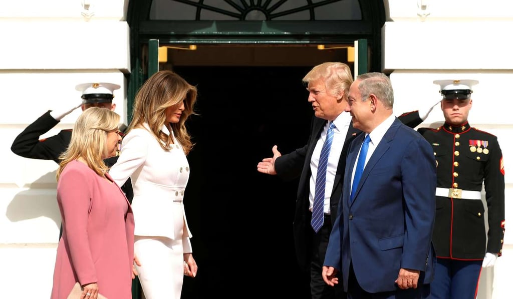 US President Donald Trump and first lady Melania Trump greet Israeli Prime Minister Benjamin Netanyahu and his wife Sara as they arrive at the South Portico of the White House in Washington on Wednesday. Photo: Reuters