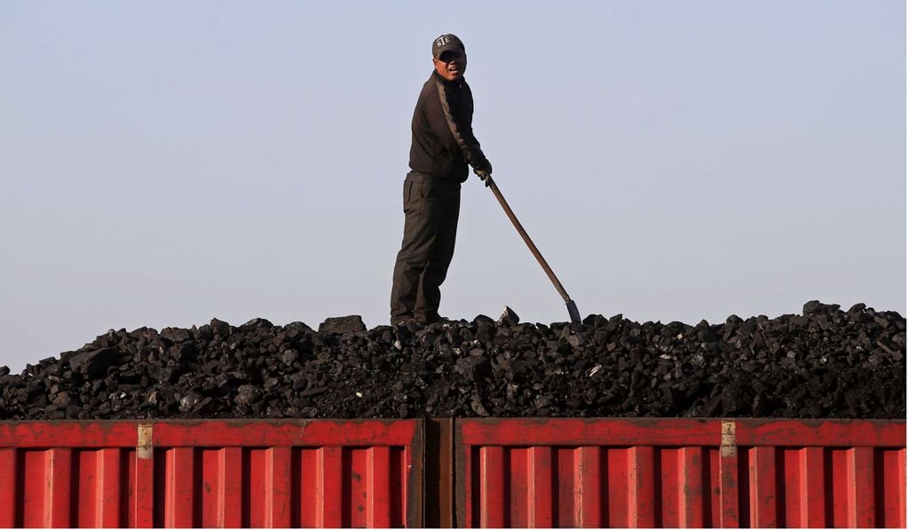 A worker loads coal on a truck at a depot near a mine of the state-owned Longmay Group on the outskirts of Jixi, in Heilongjiang province, in this 2015 photo. Coal production is largely from privately owned mines. Even though most are small, they have managed to rapidly increase production to fuel China’s industrial rise in the past two decades. Photo: Reuters