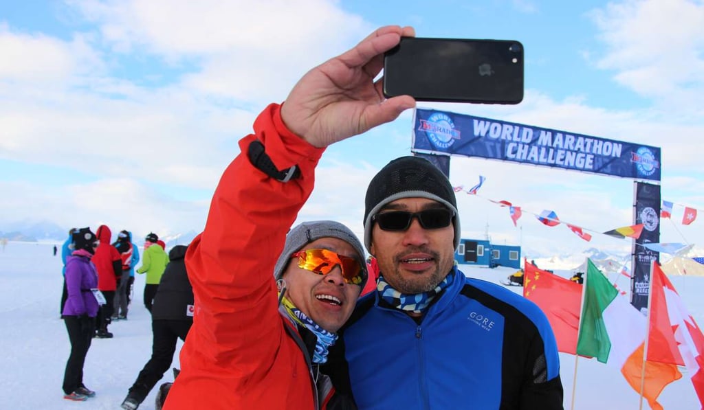 Chik Wing-keung at the finish line in Antarctica. Photos: Chik Wing-keung