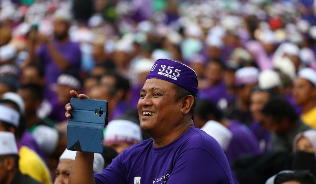 The rally in support of the adoption of a strict Islamic penal code in at Padang Merbok in Kuala Lumpur, Malaysia. Photo: Reuters