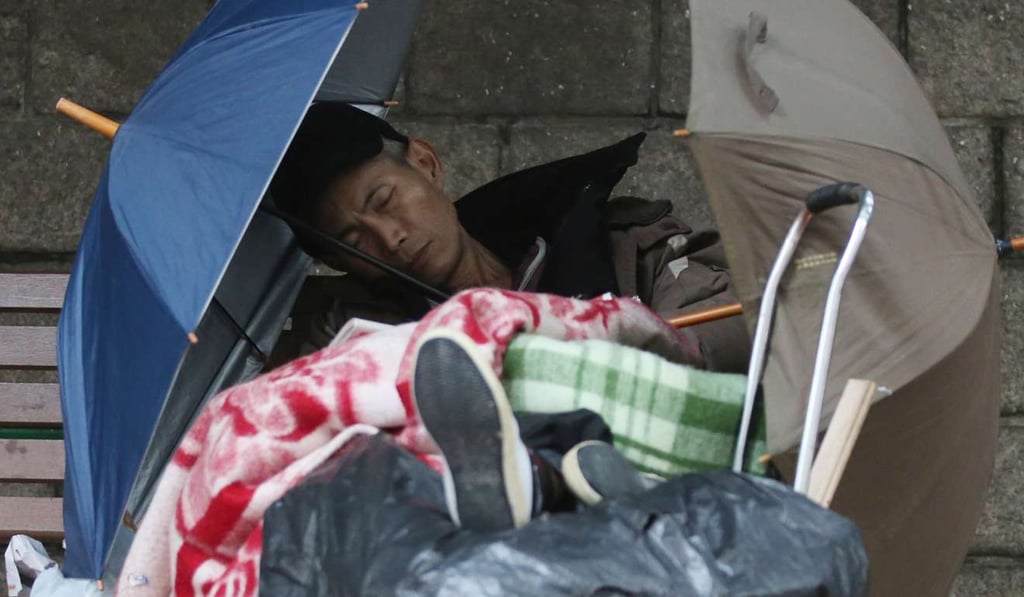 A homeless man finds shelter at a park in Yau Ma Tei. Photo: Edward Wong