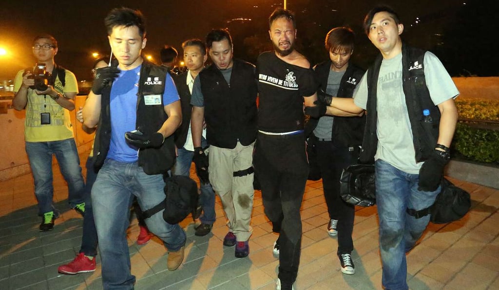 Ken Tsang (centre) following his arrest in 2014 during the Occupy protests. Photo: Nora Tam