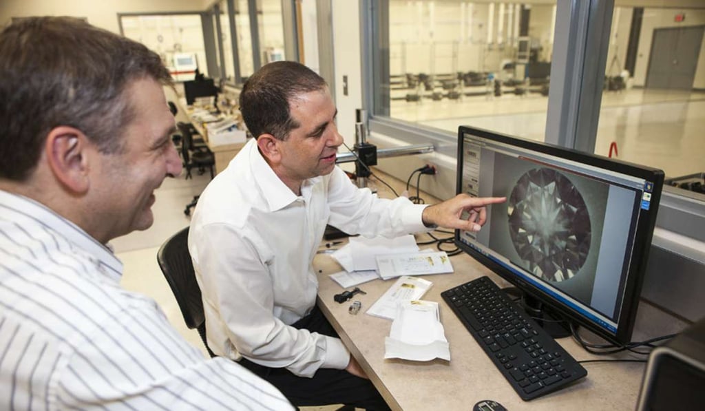 WD Lab Grown Diamonds chief technology officer Yarden Tsach (left) reviews diamond images with founder and chairman Clive Hill. Photo: Washington Diamonds