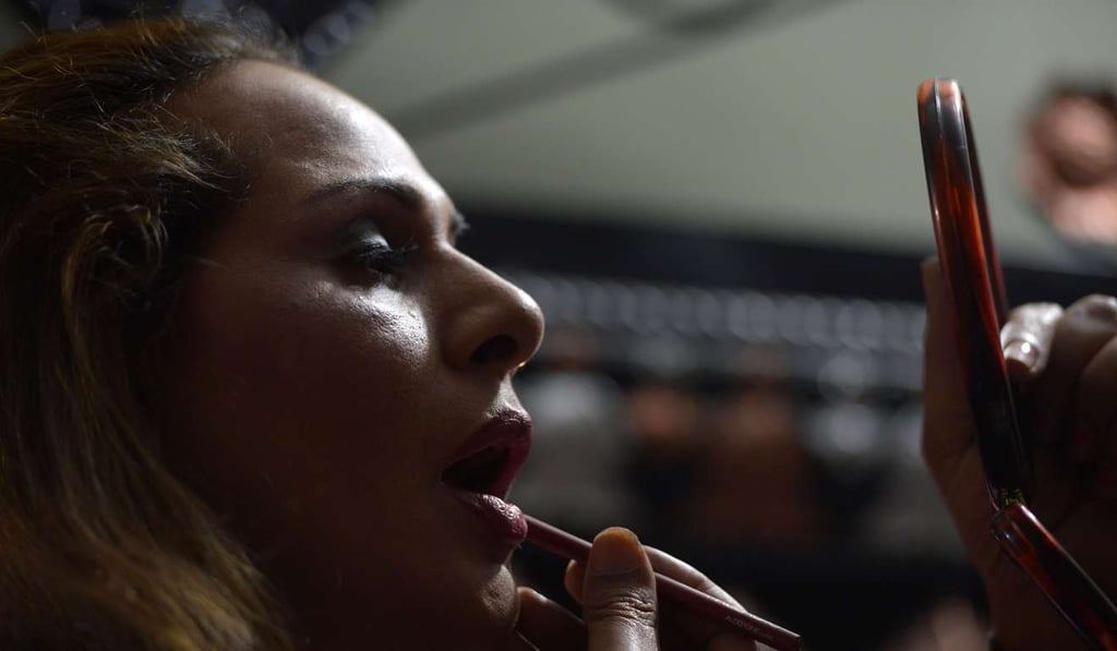Farzana, a member of the Pakistani transgender community, applies makeup at her home in Peshawar. Photo: AFP Farzana, a member of the Pakistani transgender community, applies makeup at her home in Peshawar. Photo: AFP