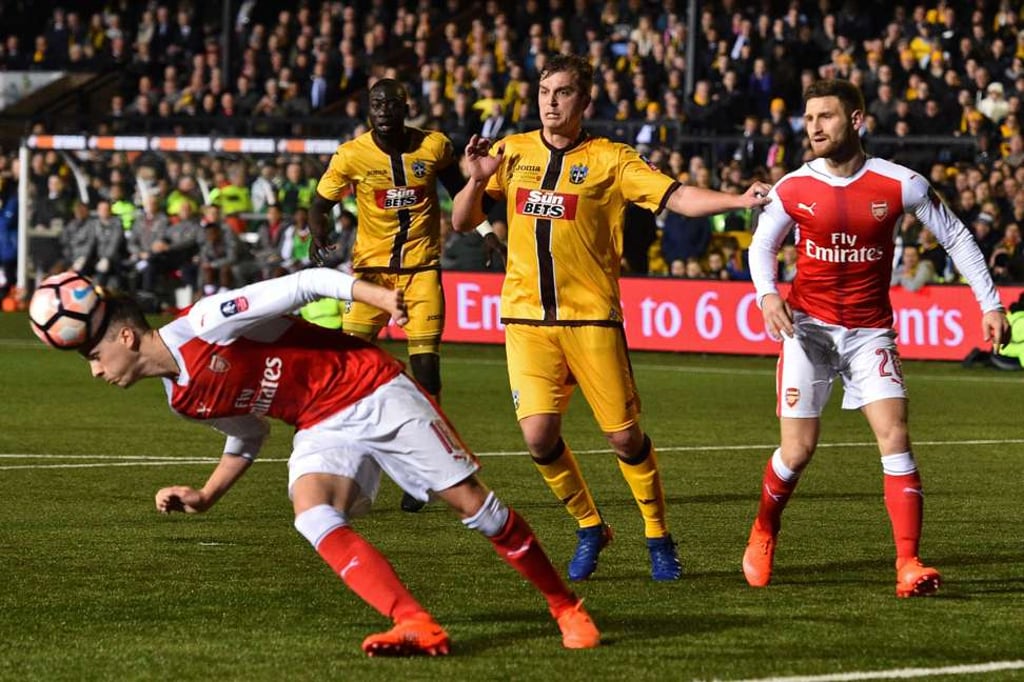 Arsenal defender Rob Holding gets his head to the ball during the FA Cup fifth round tie. Photo: AFP