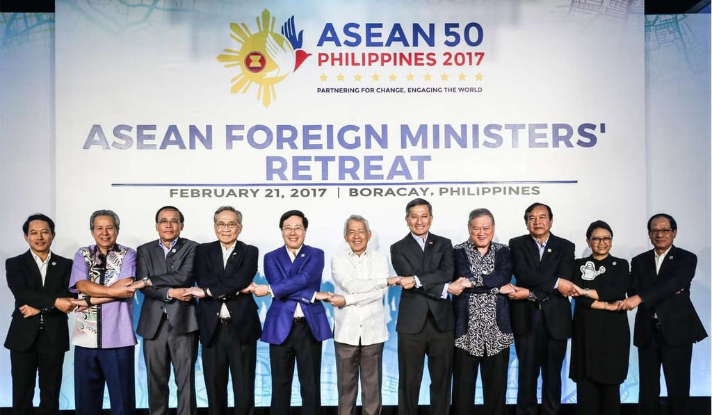Foreign ministers from the Association of South East Asian Nations (Asean) linking arms in Boracay, Aklan province, Philippines. Photo: EPA Foreign ministers from the Association of South East Asian Nations (Asean) linking arms in Boracay, Aklan province, Philippines. Photo: EPA