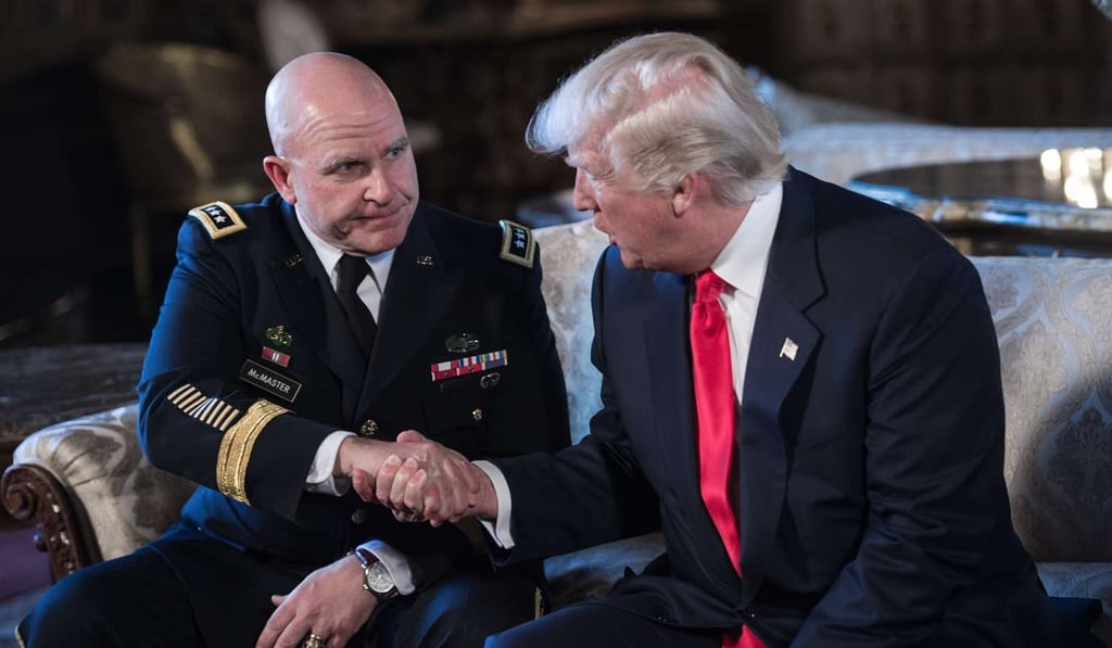 US President Donald Trump shakes hands with H.R. McMaster (L) as his national security adviser. Photo: AFP