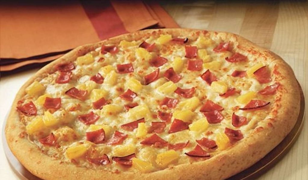 A ham and pineapple pizza - delicious or an unnatural obscenity? Photo: Pizza Hut A ham and pineapple pizza - delicious or an unnatural obscenity? Photo: Pizza Hut