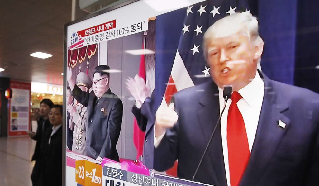 US President Donald Trump and North Korean leader Kim Jong-un feature on a news programme in South Korea. Photo: AP