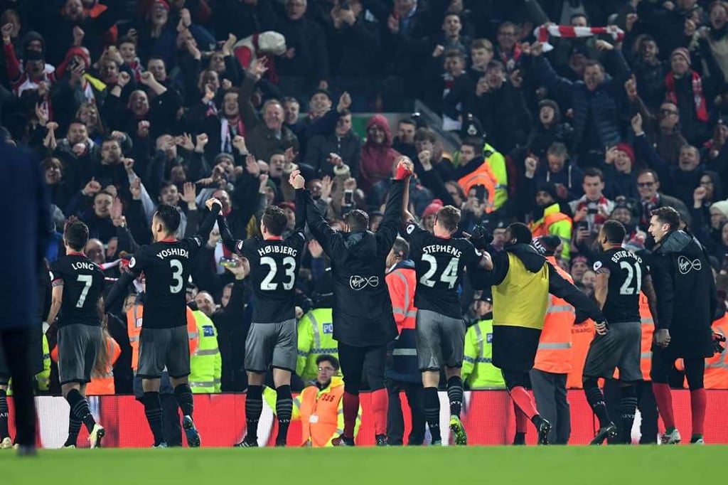 Southampton players applaud their fans at Anfield after their semi-final victory over Liverpoo. Photo: AFP
