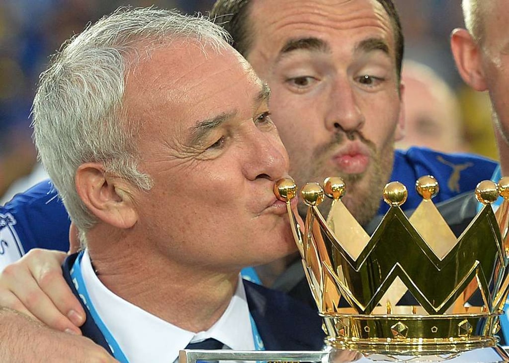 Ranieri kisses the Premier League trophy nine months ago. Photo: EPA Ranieri kisses the Premier League trophy nine months ago. Photo: EPA