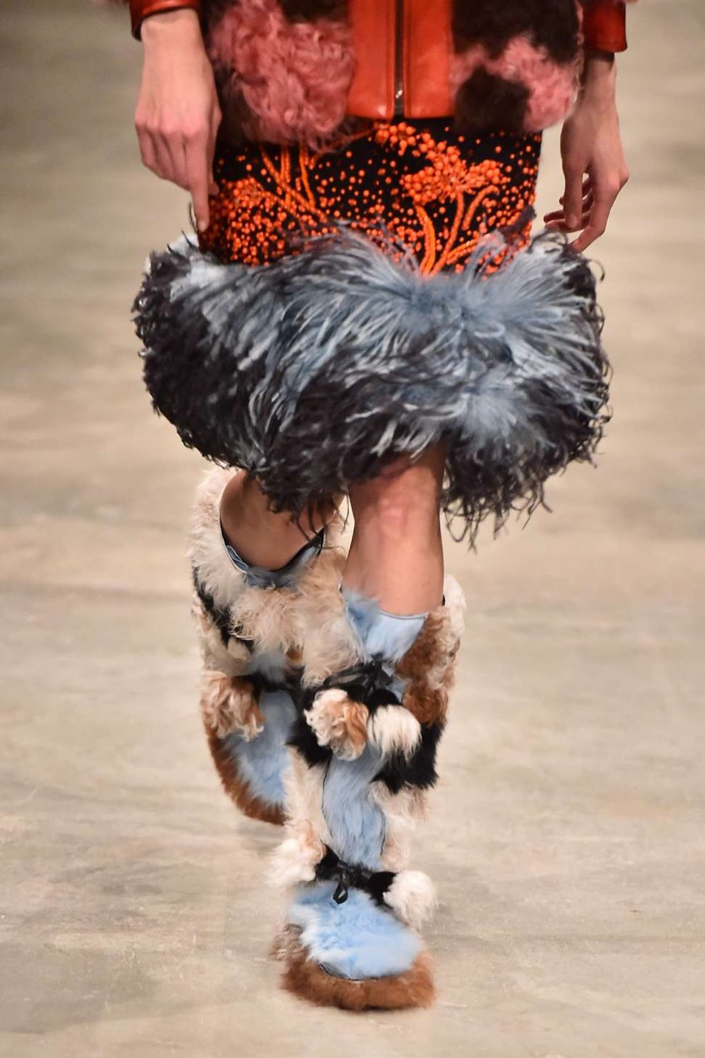 Marabou and moon boots. Photo: AFP