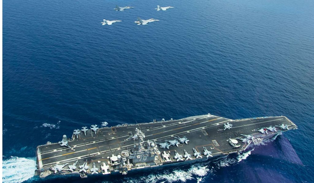 US military and Malaysian Air Force jets fly above the aircraft carrier USS Carl Vinson operating in the South China Sea during an exercise in May 2015. Photo: AFP US military and Malaysian Air Force jets fly above the aircraft carrier USS Carl Vinson operating in the South China Sea during an exercise in May 2015. Photo: AFP