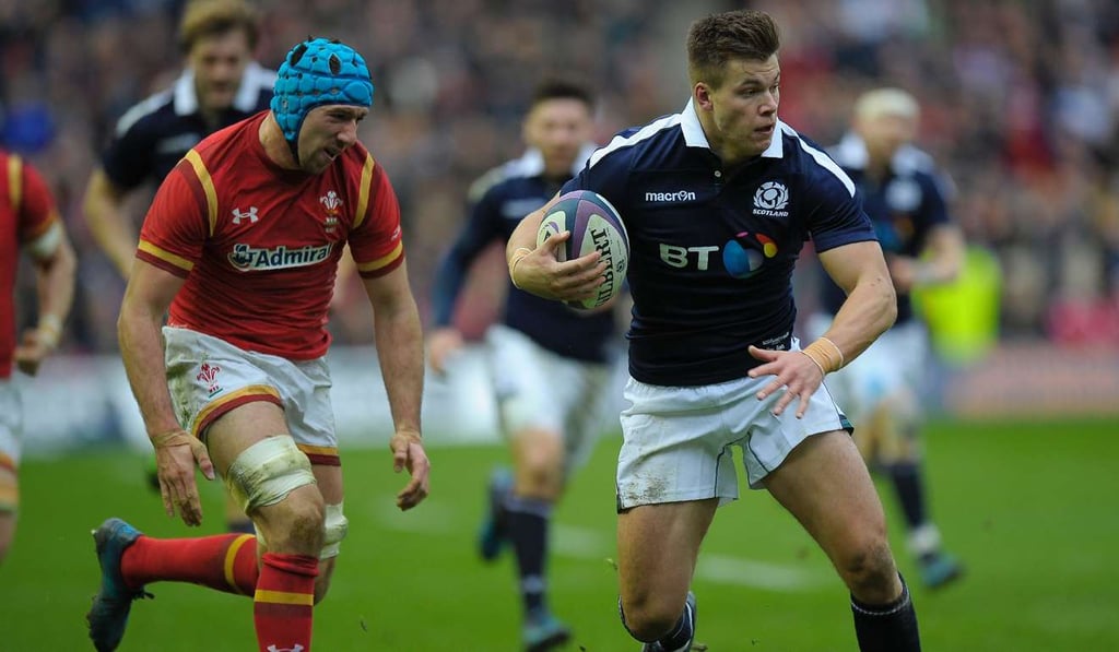 Scotland’s centre Huw Jones (right) with Wales' flanker Justin Tipuric. Photo: AFP Scotland’s centre Huw Jones (right) with Wales' flanker Justin Tipuric. Photo: AFP