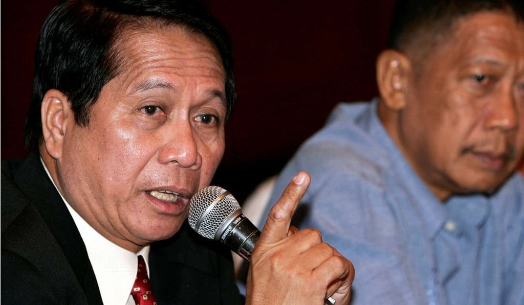 Secretary Jesus Dureza (left). Photo: Reuters