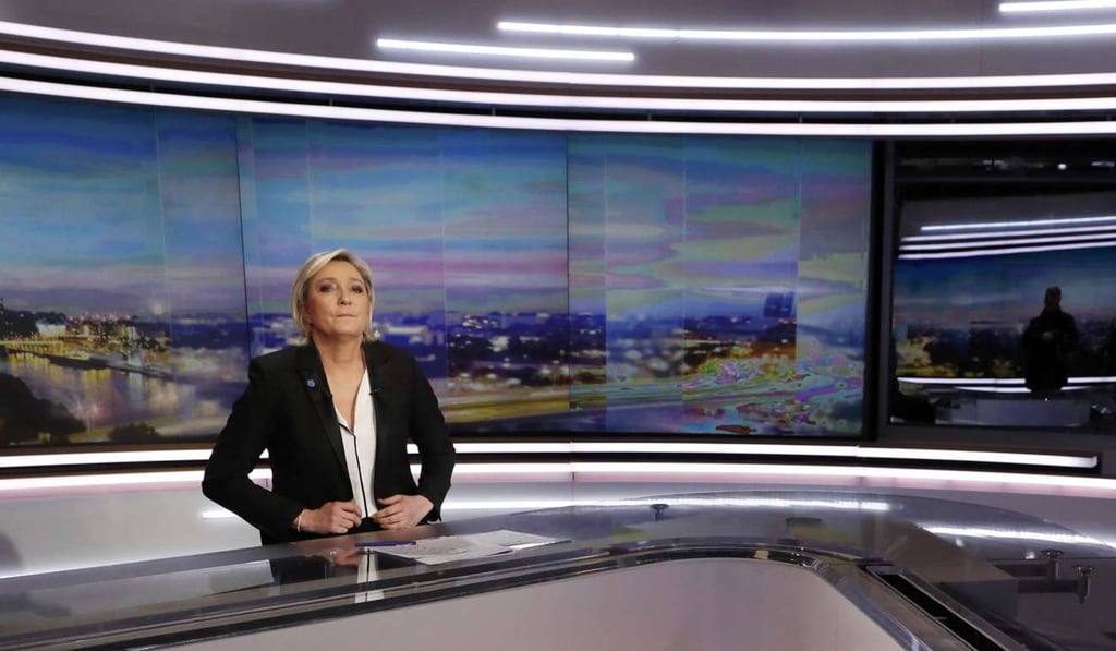 Marine Le Pen, French National Front (FN) political party leader and candidate for the 2017 presidential election, poses prior to an interview on the prime time evening news. Photo: Reuters