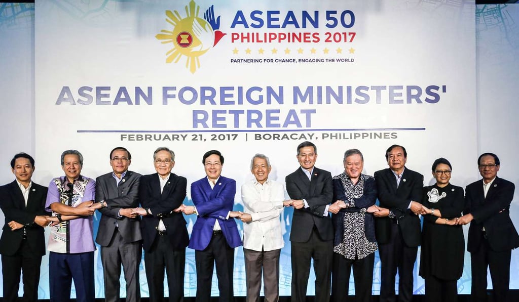 Asean foreign ministers link arms at their retreat in Boracay in the Philippines last Tuesday. Photo: Reuters