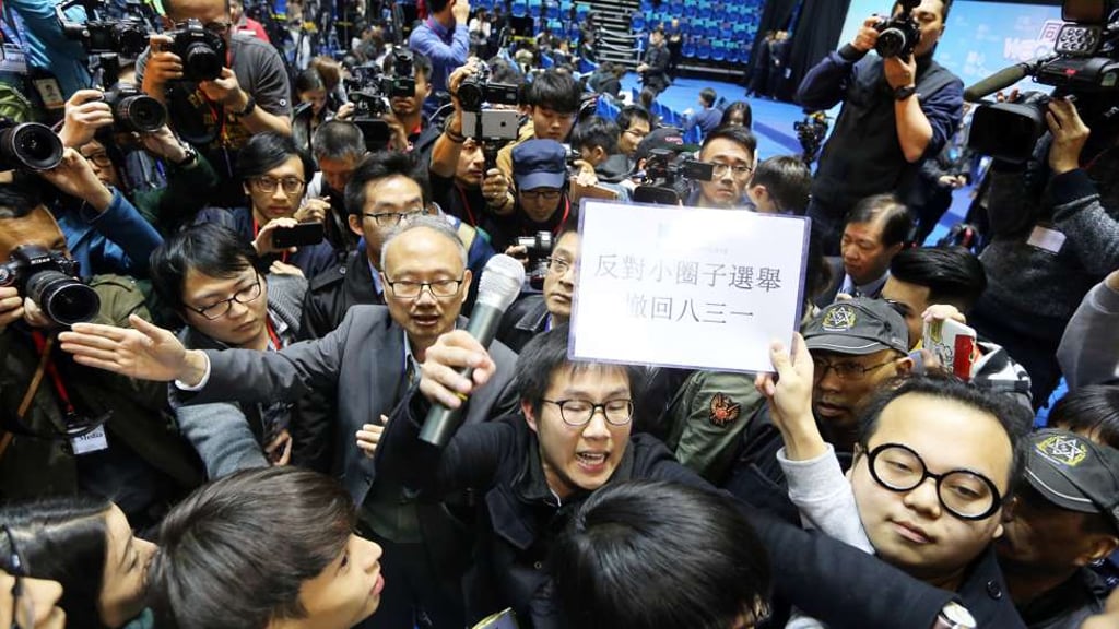 Protesters at a campaign event for Carrie Lam at MacPherson Stadium in Mong Kok. Photo: Sam Tsang