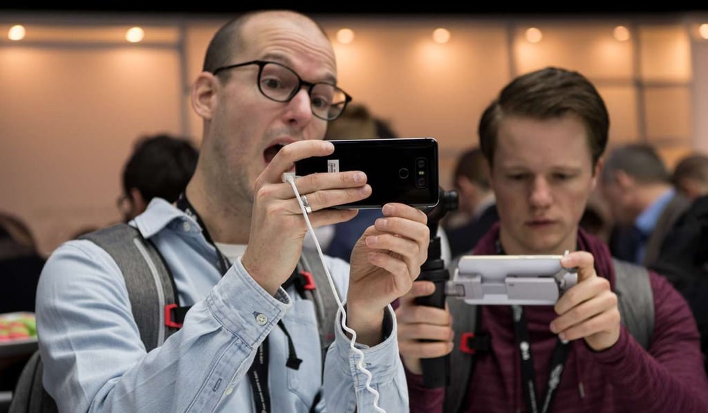 Taking a selfie with the new LG G6. Photo: AFP