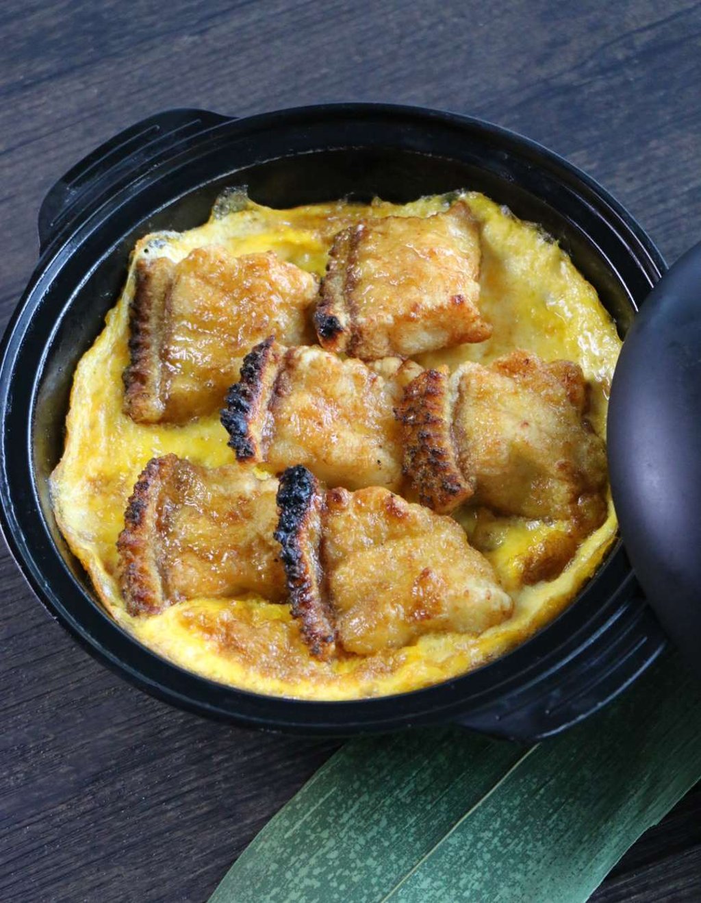 Baked oasis giant grouper intestine with foie gras and minced pork.