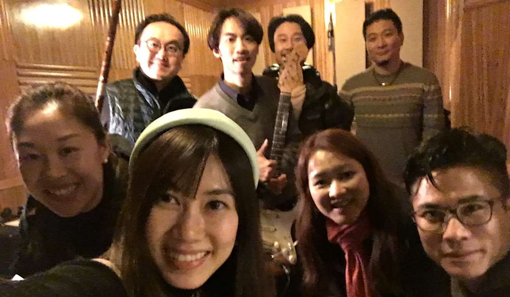 The eight performers: back (from left) Ricky Yeung, erhu player Yu Lefu (with electric guitar), qinqin and vocalist Tong Shaomin and percussionist Liang Jia; front (from left) pipa player Sha Jingshan, erhu player and vocalist Chan Pik-sum, and yangqin players Yanki Ma and Bryan Lai.