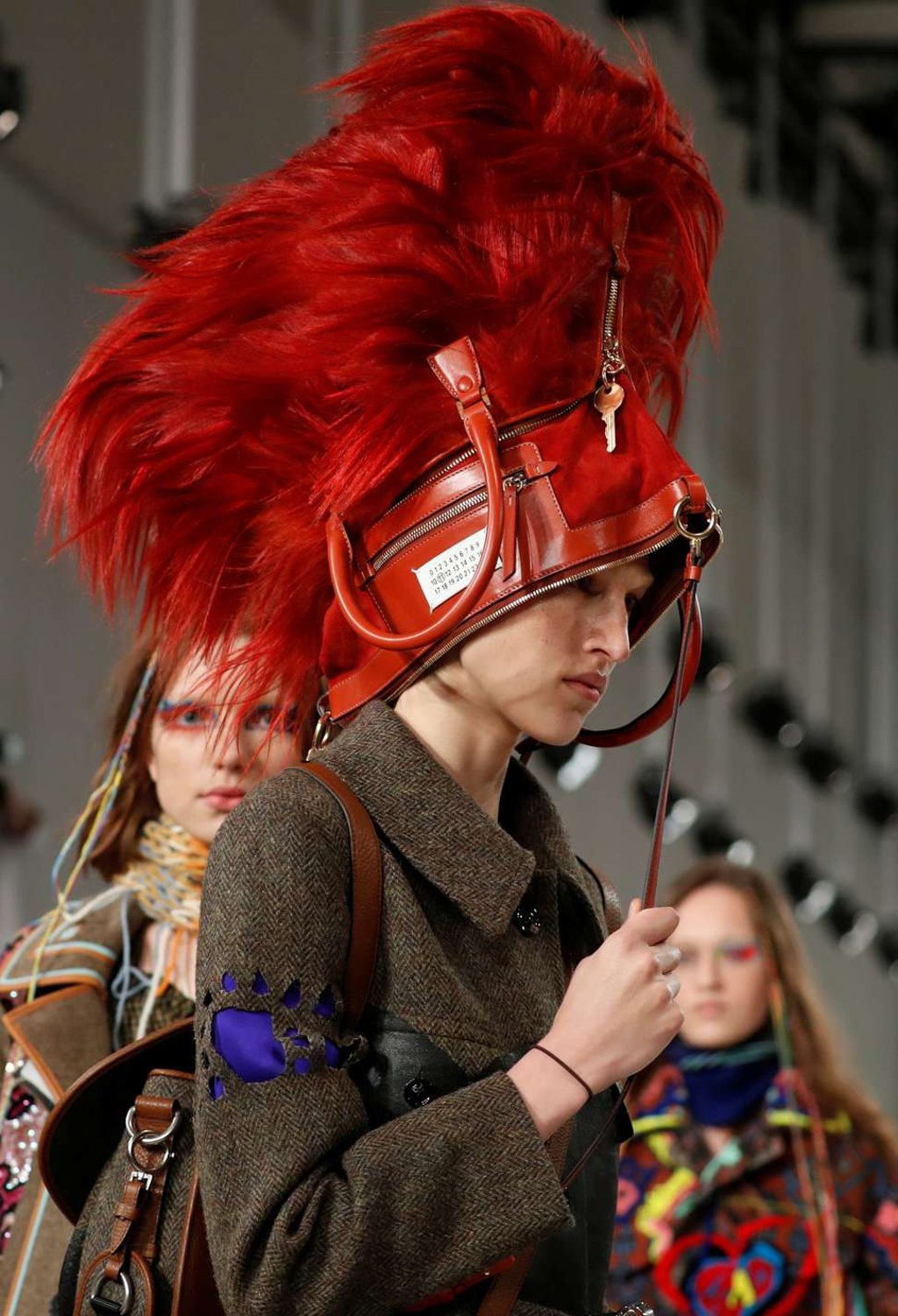 Accessories repurposed as hats were a feature of the Maison Margiela show. Photo: Reuters