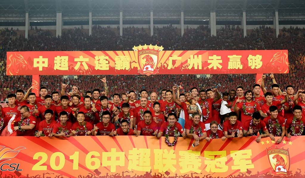 Guangzhou Evergrande celebrate winning the Chinese Super League for a sixth straight season in 2016. Photo: Xinhua