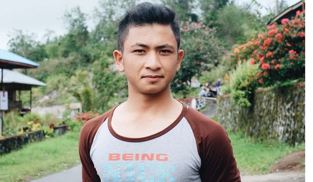 Fernando Pantow, 22, worked as an illegal gold miner for six years before becoming a tour guide amid Manado’s tourism boom. Photo: Karim Raslan
