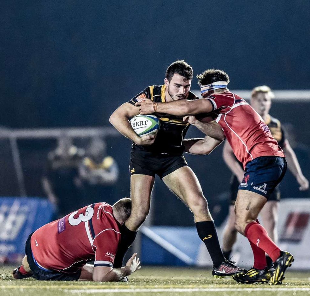 Jack Capon with ball in hand for Tigers in the Hong Kong Premiership. Jack Capon with ball in hand for Tigers in the Hong Kong Premiership.