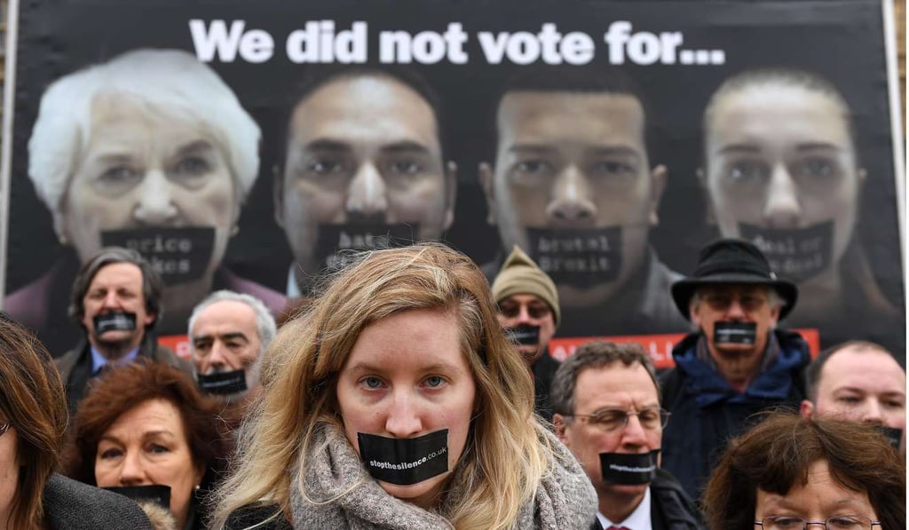 “Stop hard Brexit” activists launched a nationwide poster campaign outside Parliament in London, calling for the Lords to make amendments to the Article 50 bill. Photo: EPA