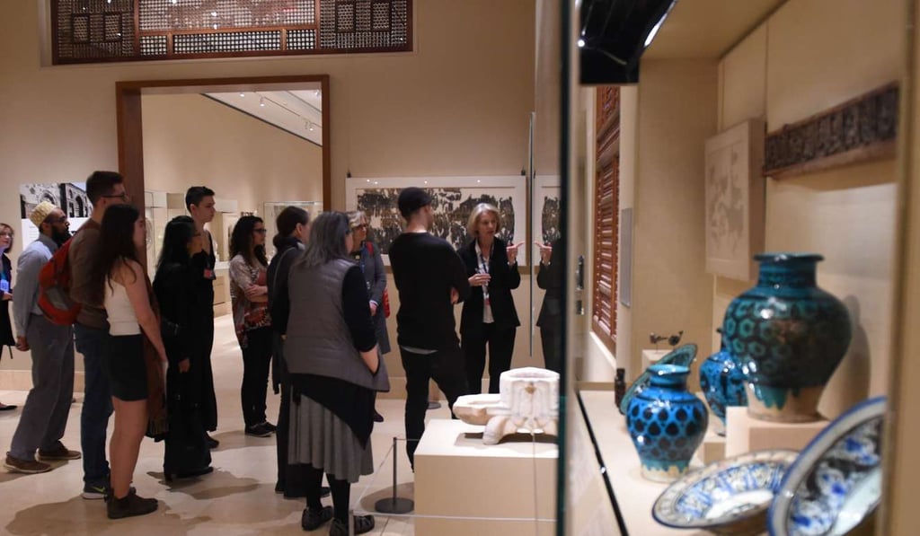 People listen to curators at the Metropolitan Museum of Art February 24, 2017 as ten-minute gallery talks are given in the permanent collection created in the lands that are now Iraq, Syria, Iran and Yemen, four of the seven countries affected by the recent travel ban. Photo: AFP People listen to curators at the Metropolitan Museum of Art February 24, 2017 as ten-minute gallery talks are given in the permanent collection created in the lands that are now Iraq, Syria, Iran and Yemen, four of the seven countries affected by the recent travel ban. Photo: AFP