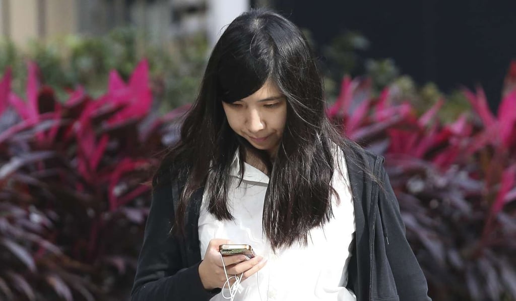 Hui Ka-ki outside District Court in Wan Chai last month. She faces a joint charge of rioting. Photo: K. Y. Cheng