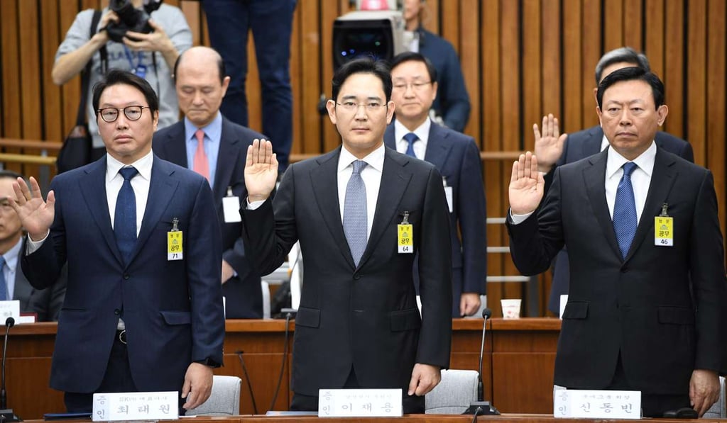 SK Group chairman Chey Tae-won (L), Samsung Group's heir-apparent Lee Jae-yong (C) and Lotte Group Chairman Shin Dong-bin take an oath during a parliamentary probe into a scandal engulfing President Park Geun-hye at the National Assembly in Seoul. File photo: EPA SK Group chairman Chey Tae-won (L), Samsung Group's heir-apparent Lee Jae-yong (C) and Lotte Group Chairman Shin Dong-bin take an oath during a parliamentary probe into a scandal engulfing President Park Geun-hye at the National Assembly in Seoul. File photo: EPA