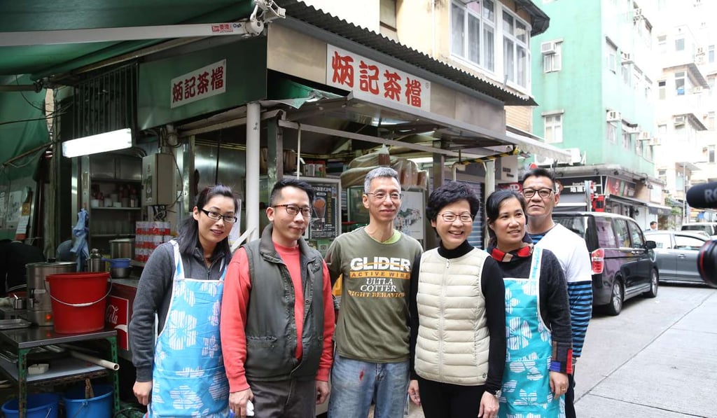 Carrie Lam (third from right) visits a food stall in Tai Hang on Saturday. Photo: Carrie Lam’s campaign office