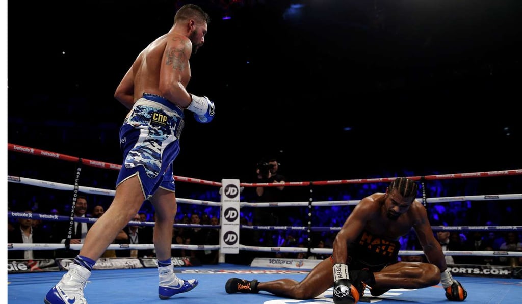 David Haye is knocked down by Tony Bellew. Photo: Reuters