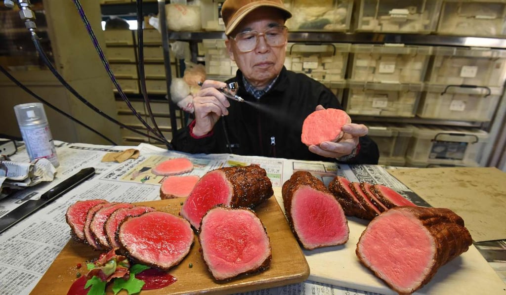 Noriyuki Mishima, a craftsman at Fake Food Hatanaka, making roast beef. Photo: AFp Noriyuki Mishima, a craftsman at Fake Food Hatanaka, making roast beef. Photo: AFp