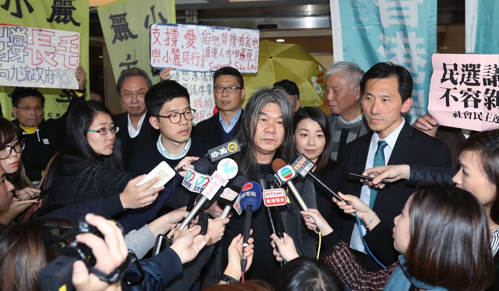Lawmakers Nathan Law (left), Leung Kwok-hung, Lau Siu-lai and Edward Yiu outside the High Court. Photo: Edward Wong