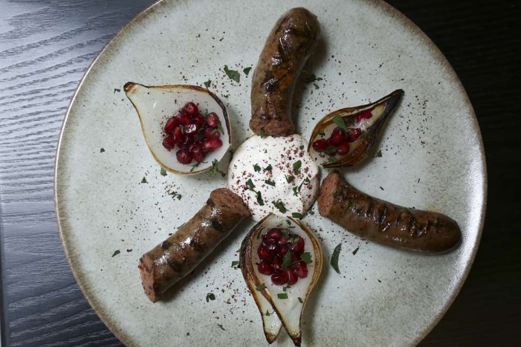Merguez and onion. Photo: Jonathan Wong