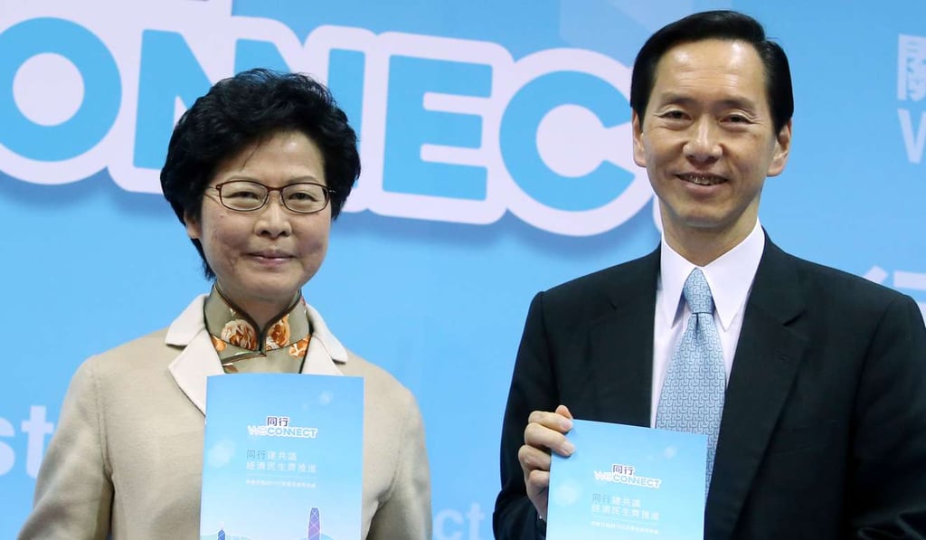 Carrie Lam Yuet-ngor with her campaign office chief Bernard Chan present Lam’s full suite of election pledges, which were criticised by rival John Tsang. Photo: Sam Tsang
