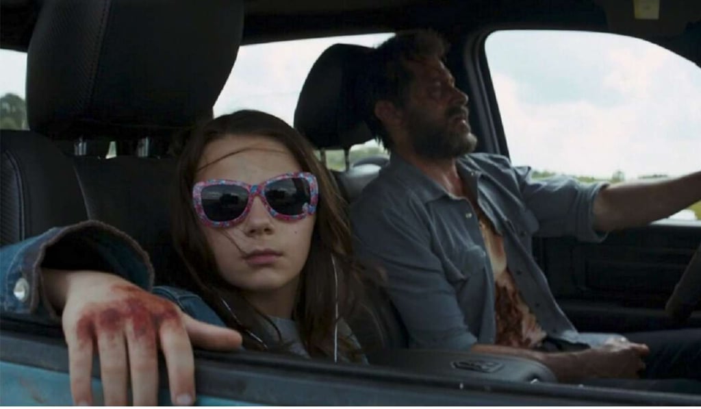 Hugh Jackman and co-star Dafne Keen.