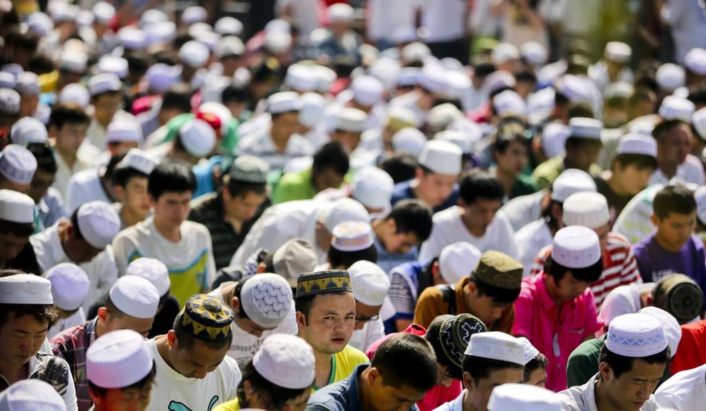 Chinese Muslims attend prayers at the Niujie Mosque in Beijing. Photo: EPA Chinese Muslims attend prayers at the Niujie Mosque in Beijing. Photo: EPA