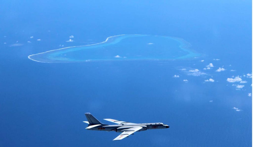 A Chinese H-6K bomber patrols islands and reefs including Scarborough Shoal in the South China Sea. File photo: Reuters